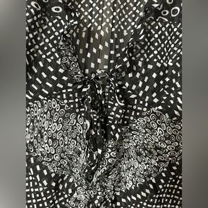 Black and white ruffled tank top